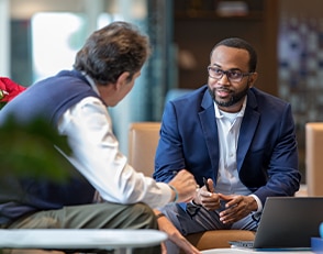 Two men in a discussion.